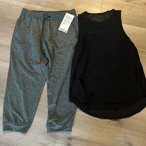 Lululemon Athletica Black Tank and dark green leggings
